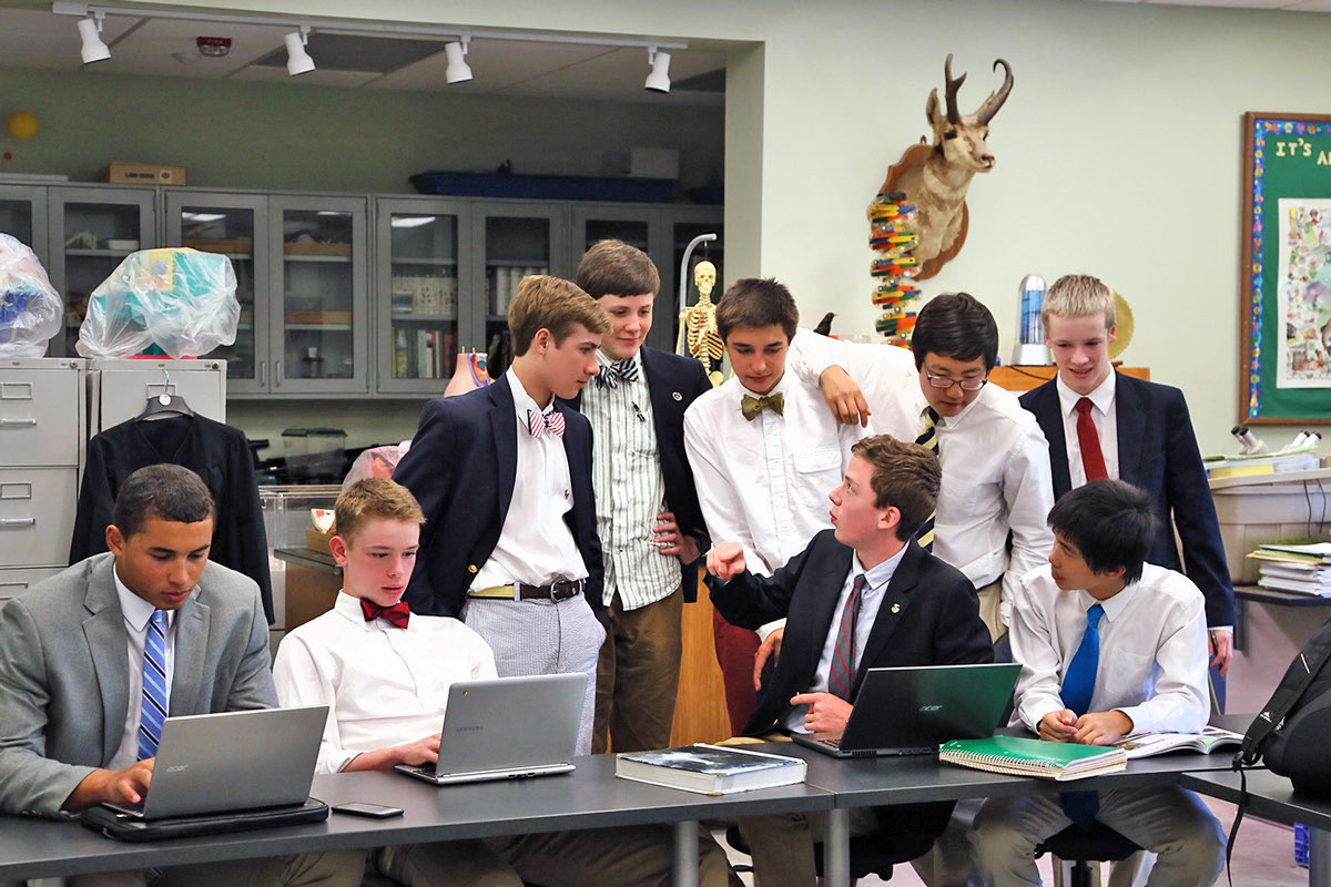 Students at desks in a high-school biology classroom